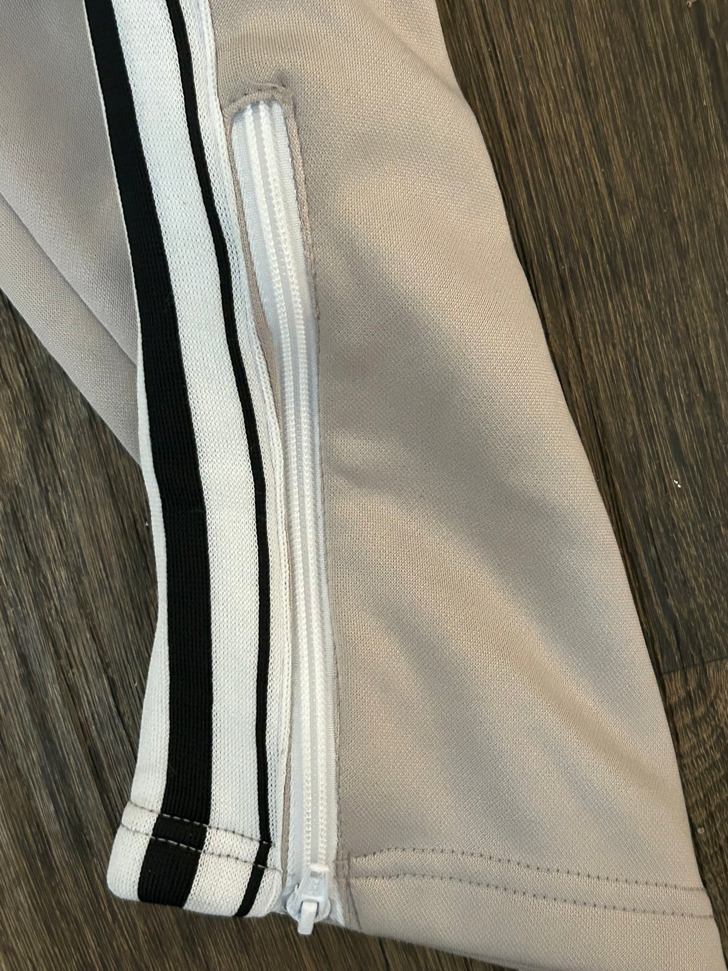 grey track pants